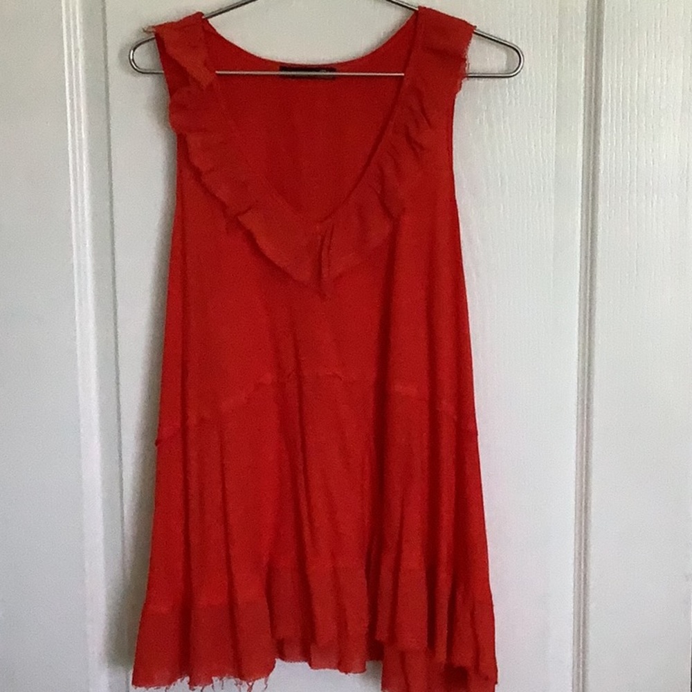 Misses/ladies tomato red tank top with empire waist and flare bottom